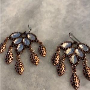 Women’s costume earrings .